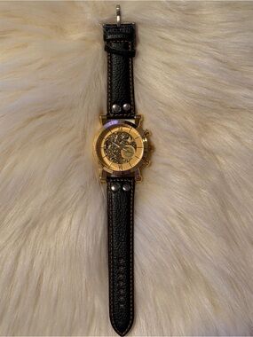 Forsining Men's Gold Skeleton Dial Watch with Black Leather Strap